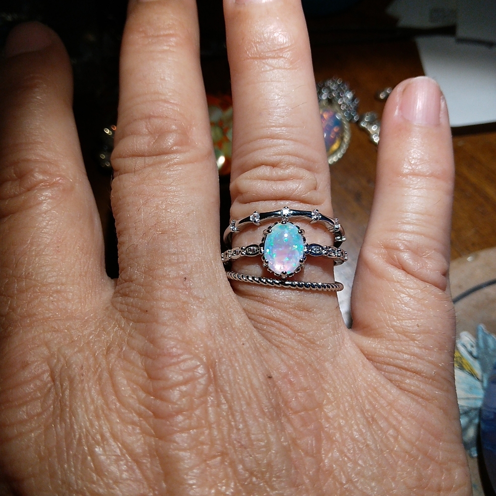 SALE! Nwot sterling silver plated 3 Stackable rings, faux opal, CZ, and spiril